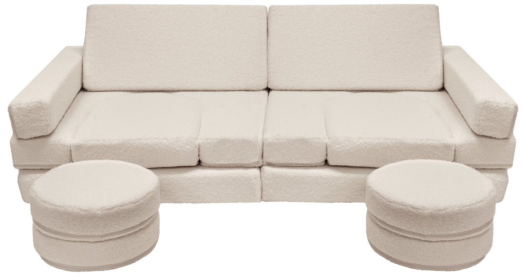 Modular bouclé sofa bed, multifunctional foam blocks, car with steering wheel