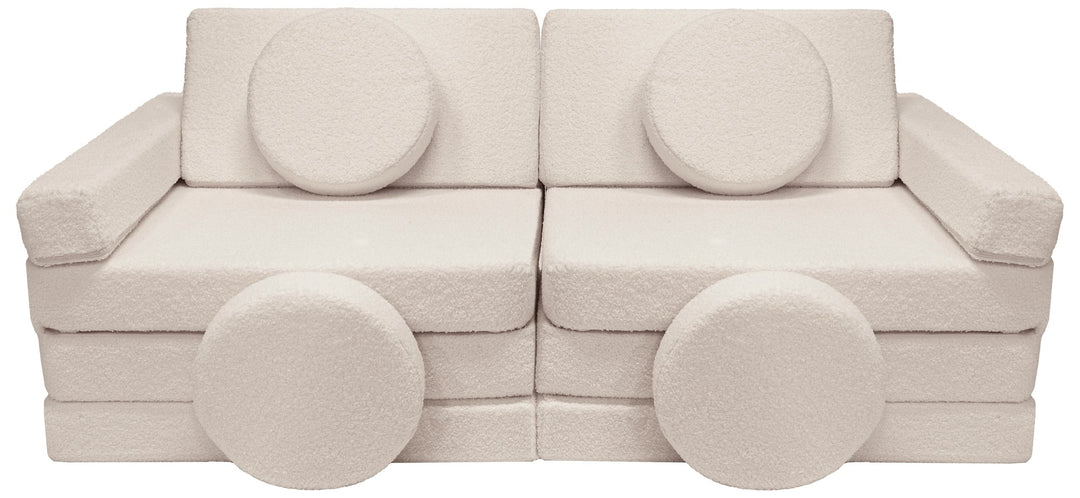 Modular bouclé sofa bed, multifunctional foam blocks, car with steering wheel