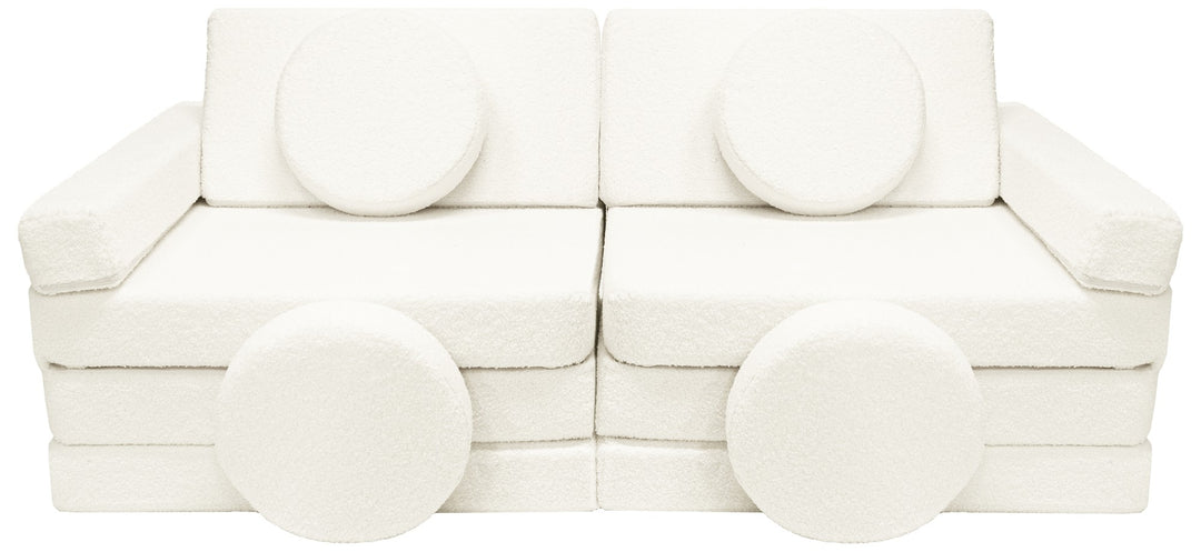 Modular bouclé sofa bed, multifunctional foam blocks, car with steering wheel