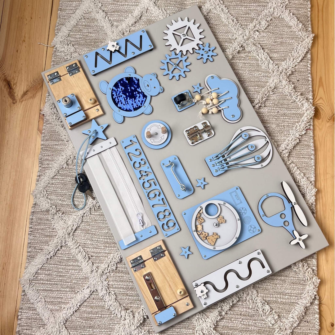 Montessori busy board with doors and locks (40×60 cm)